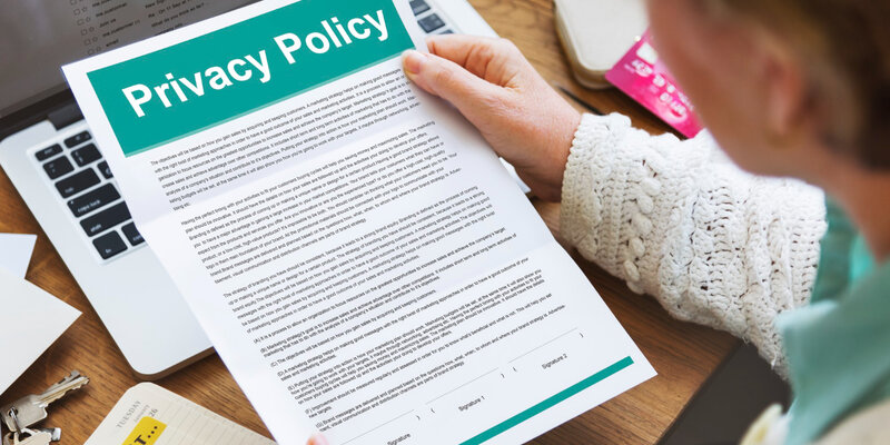 Business professional reviewing GDPR privacy policy for analytics compliance